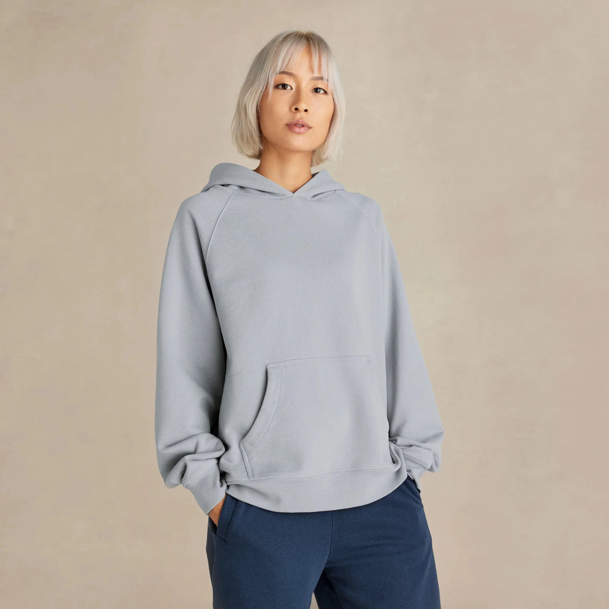 Dense organic French terry on the Pulse Hood: the fabric construction that resists pilling