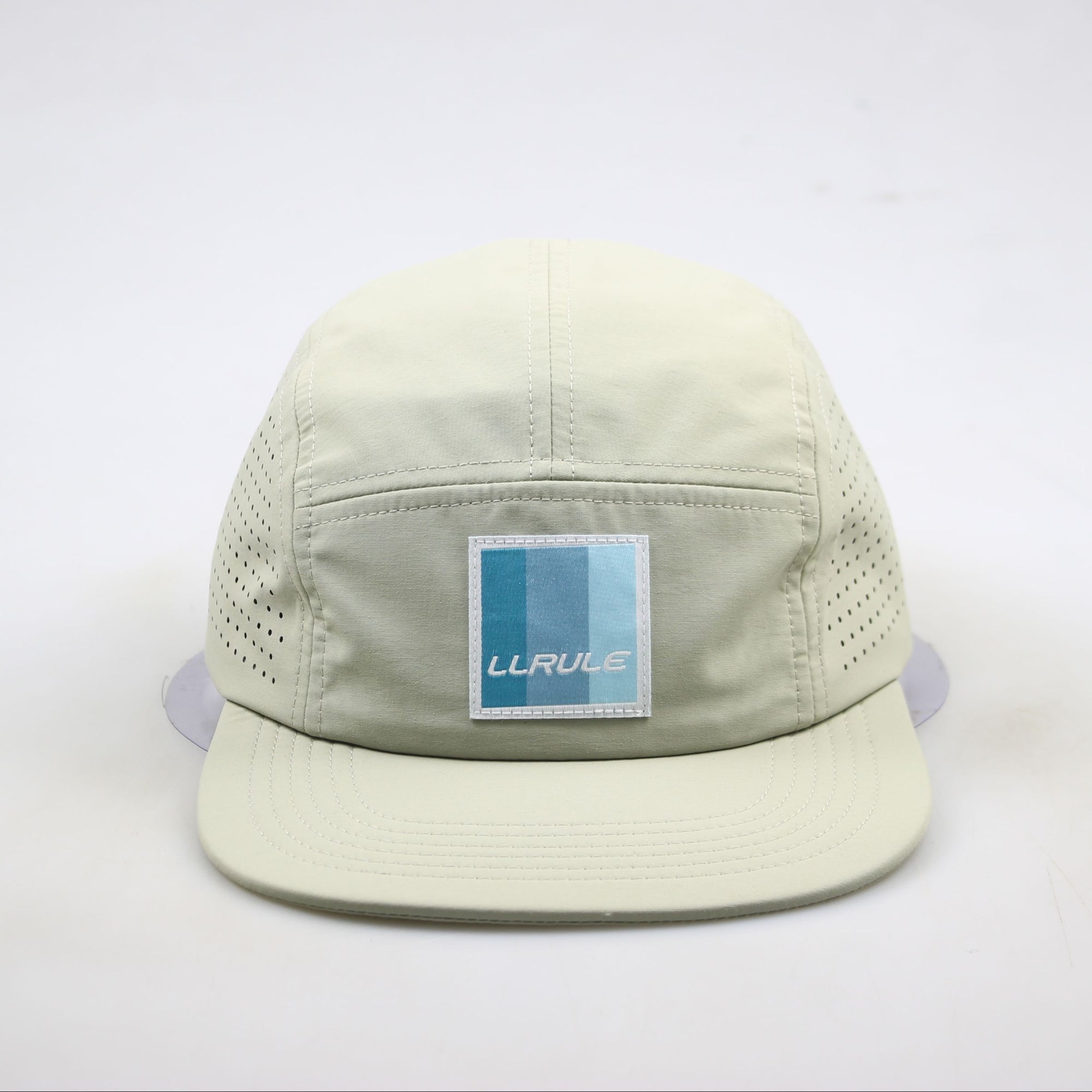 Front view of Ridgeflow sandstone cap displaying logo embroidery detail