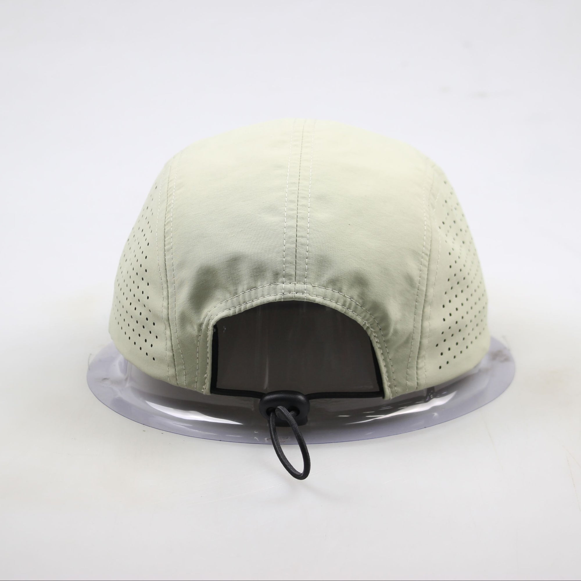 Back view of Ridgeflow pull cap in sandstone showing fitted construction
