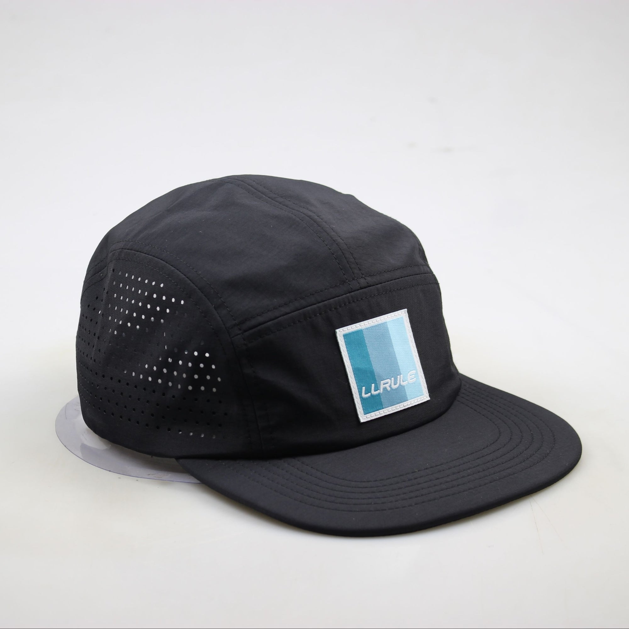 Ridgeflow snap-back baseball cap in black with adjustable closure
