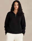 Form Organic Quarter Zip in Black, women's side view with flatlock seam detail