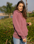 Eternal Fabric Hoodie in Pigment Maroon, women's side view showing jersey-lined hood