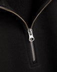 Form Organic Quarter Zip in Black, women's flat-knit side ribbing and hem detail